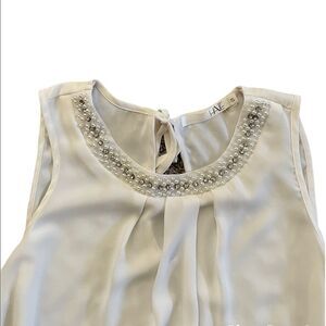 White Sleeveless flowy Blouse with rhinestone and pearl accents Small
